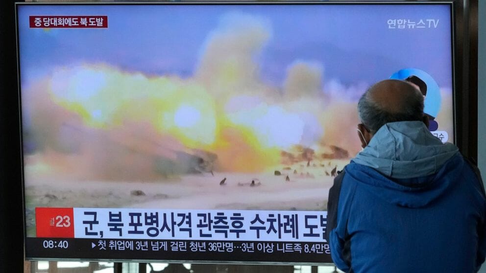 A TV screen shows a file image of North Korea's military exercise during a news program at the Seoul Railway Station in Seoul, South Korea, Wednesday, Oct. 19, 2022. South Korea’s military says North Korea has fired around 130 suspected artillery rounds Monday, Dec. 5, 2022, in waters near the rivals’ western and eastern sea borders in another display of belligerence.