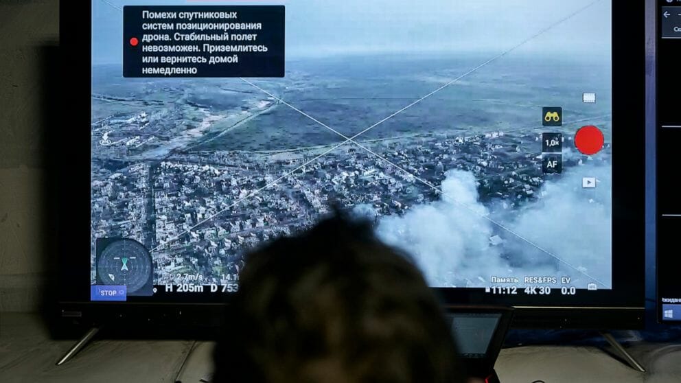 A Ukrainian soldier watches a drone feed from an underground command center in Bakhmut, Donetsk region, Ukraine, Sunday, Dec. 25, 2022.
