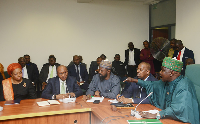 L-R: Deputy Governor, Central Bank of Nigeria, Mrs Aishah Ahmad; Mr Godwin Emefiele; Member, House of Representatives, Dr. Makki Yalleman; Clerk of the Committee, Dr Yahaya Danzaria; Majority Leader, Alhassan Ado-Doguwa; during the Ad Hoc committee meeting set up by the House to investigate the Naira crisis in the Country, in Abuja... Photo: Olukayode Jaiyeola