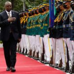 Defense Secretary Lloyd Austin reviews an honor guard upon arrival at the Department of National Defense at Camp Aguinaldo military camp in Quezon City, Manila, Philippines, Feb. 2, 2023.