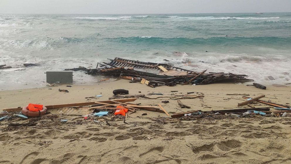 This photo obtained from Italian news agency Ansa, taken on Feb. 26, 2023 shows debris of a shipwreck washed ashore in Steccato di Cutro, south of Crotone, after a migrants' boat sank off Italy's southern Calabria region.