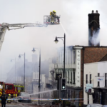 Firefighters dealing with a fire in Midhurst, West Sussex, which includes a 400-year-old hotel said to be housing Ukrainian refugees