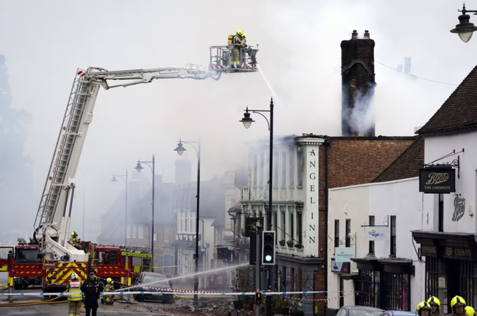 Firefighters dealing with a fire in Midhurst, West Sussex, which includes a 400-year-old hotel said to be housing Ukrainian refugees