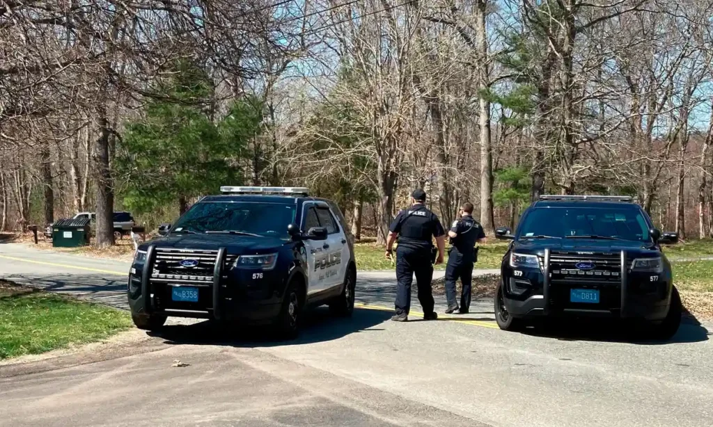 Police block a road in North Dighton, Massachusetts, on 13 April. Photo: Michelle R Smith/AP